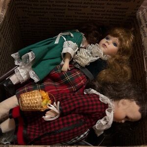 Source Unknown Porcelain Doll Collection with Blue and Green Outfits